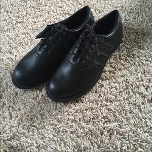 Men’s black adidas golf shoes
